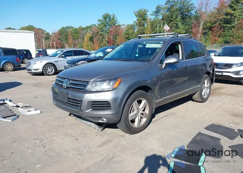 2011 Volkswagen Touareg Vr6 Lux z USA, uszkodzony, nr VIN WVGFF9BP8BD003162